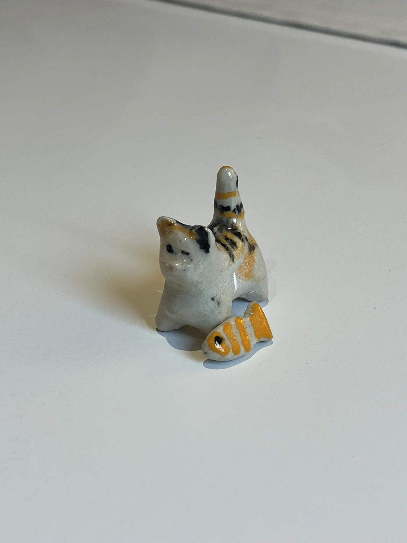 Cat and fish sculpture made by an SAH guest in 2026