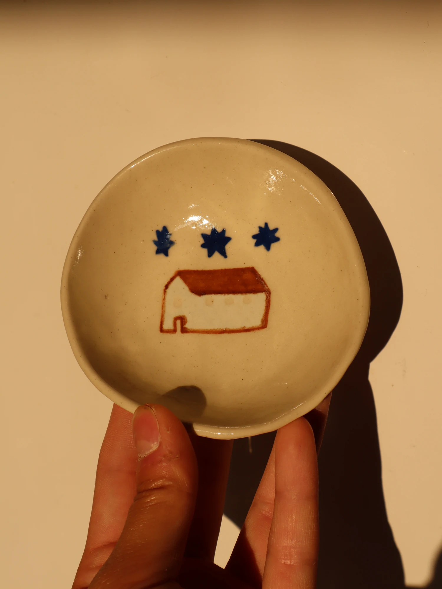 trinket - the house and star side view