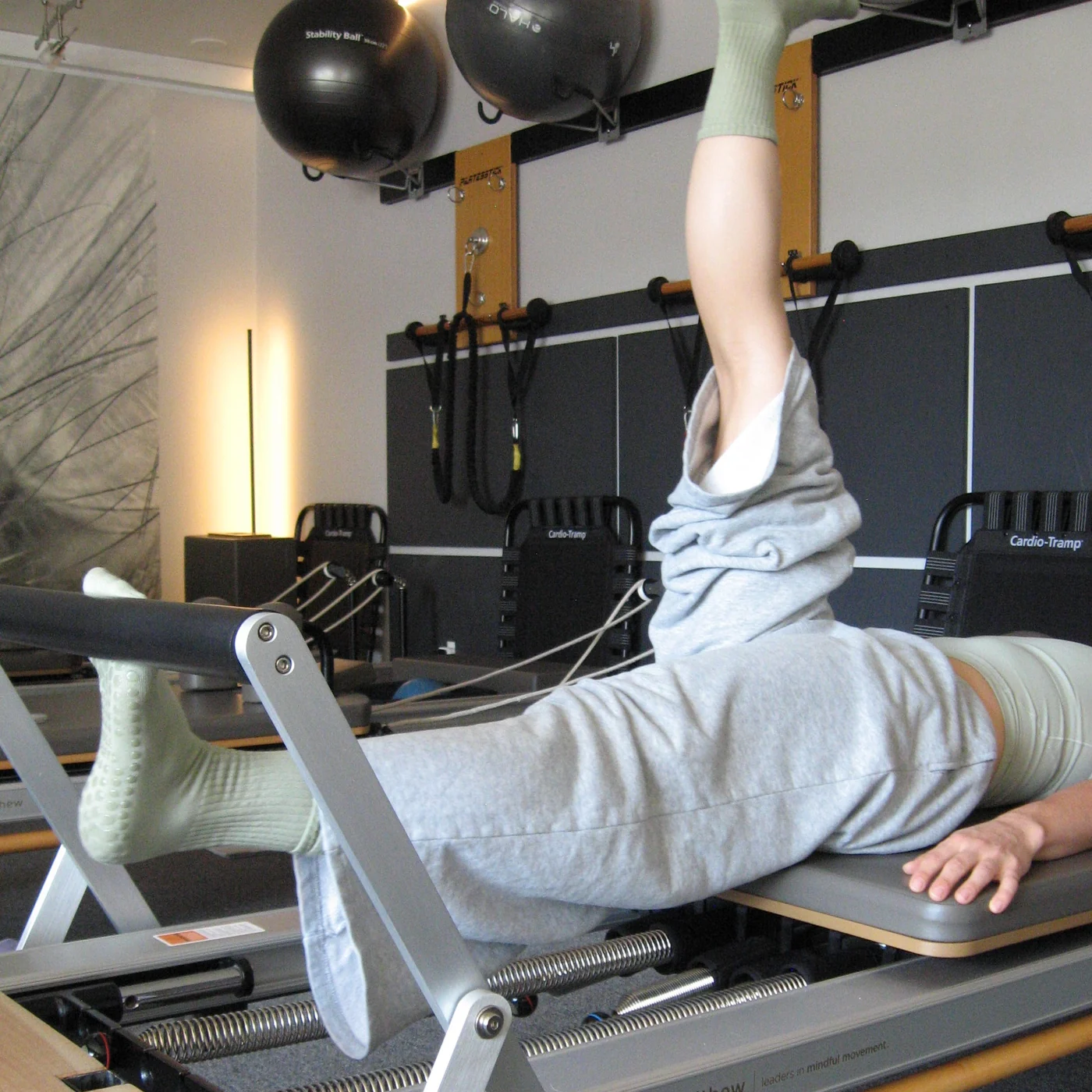 SAH grip socks worn on the reformer